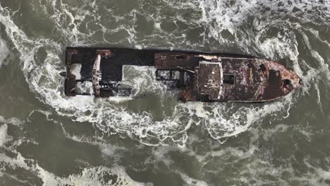 zeila shipwreck ruins abandoned on namibia's skeleton coast, africa - aerial top view