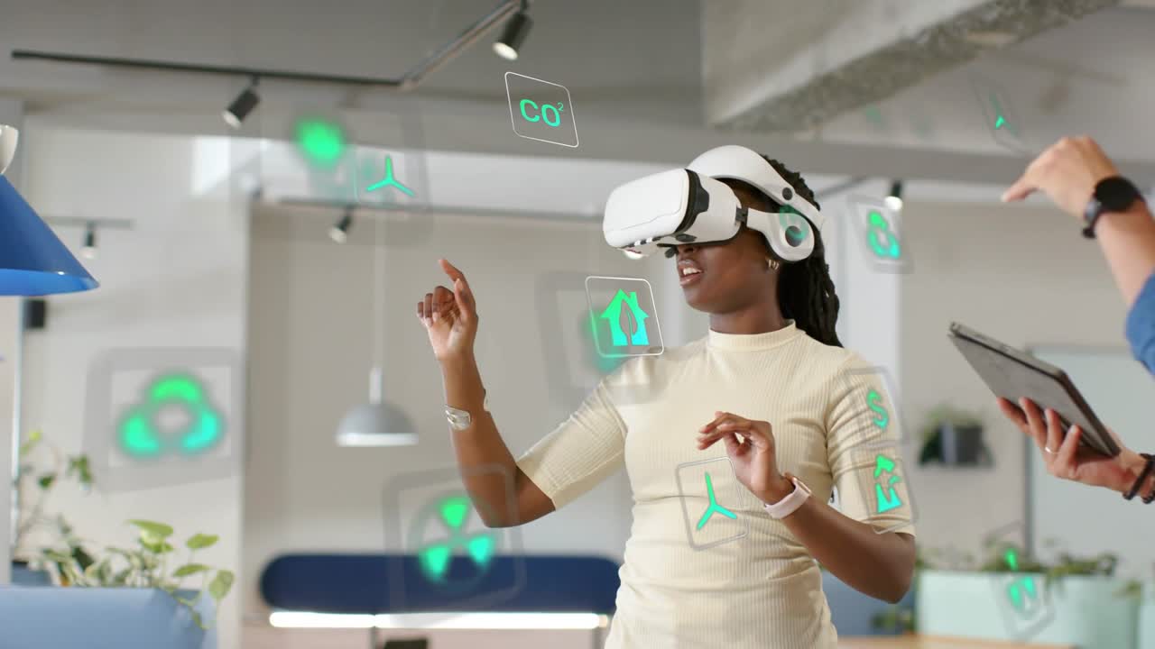 Woman wearing VR headset activating tech UI, testing green icons while man guiding tablet