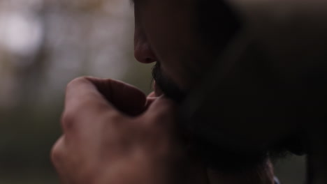 man preparing drugs outdoors
