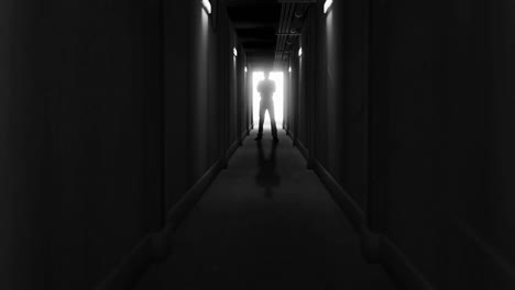 Animation-of-man-silhouette-standing-in-dark-corridor