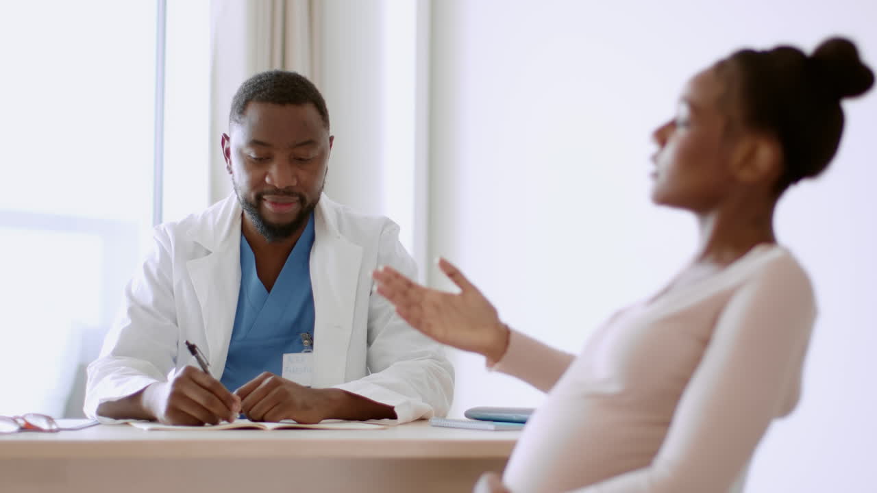 Doctor Consultation with Pregnant Woman