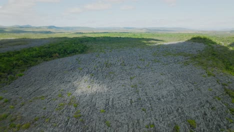 Rock-filed-with-shadow-and-sun-shine-through-the-clouds