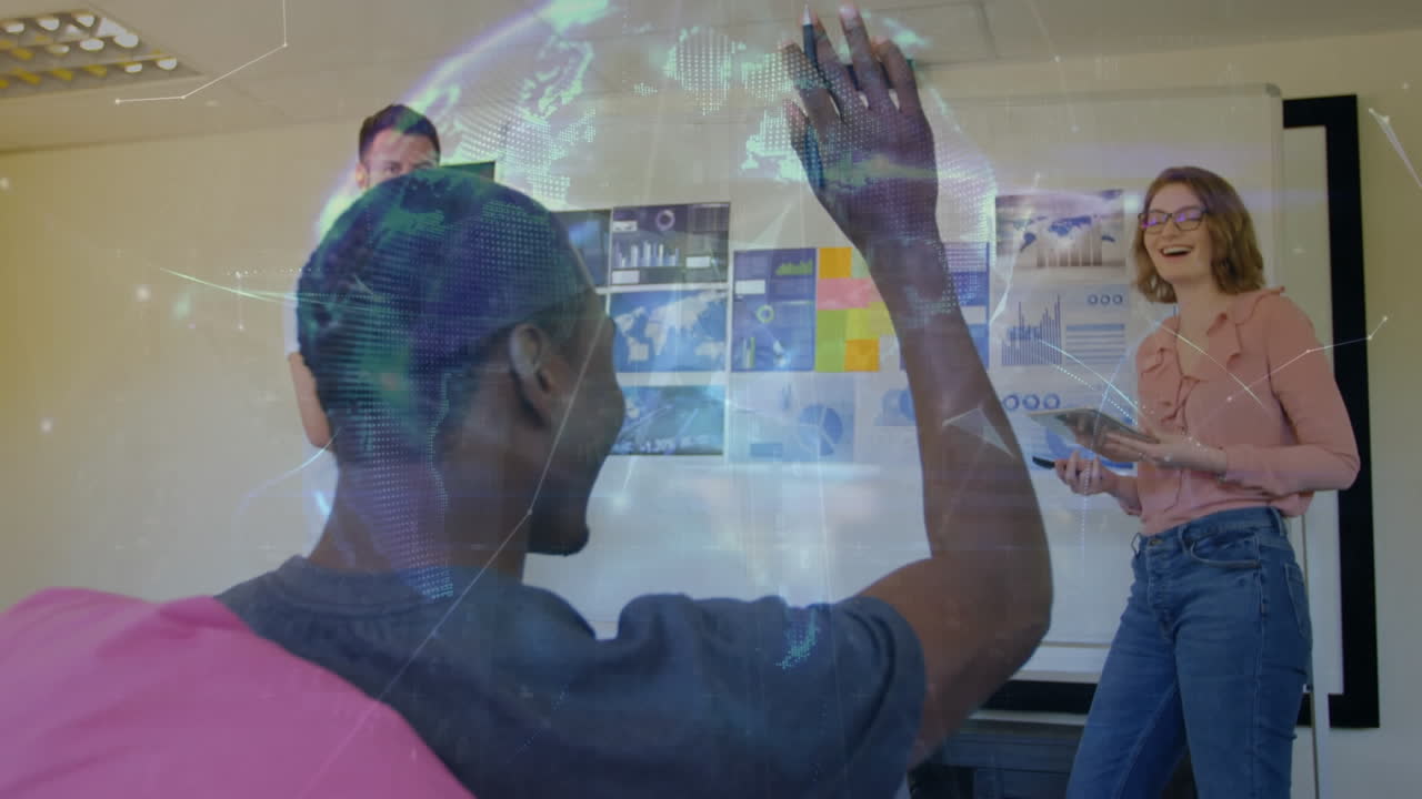 Animation of globe over diverse business people in office