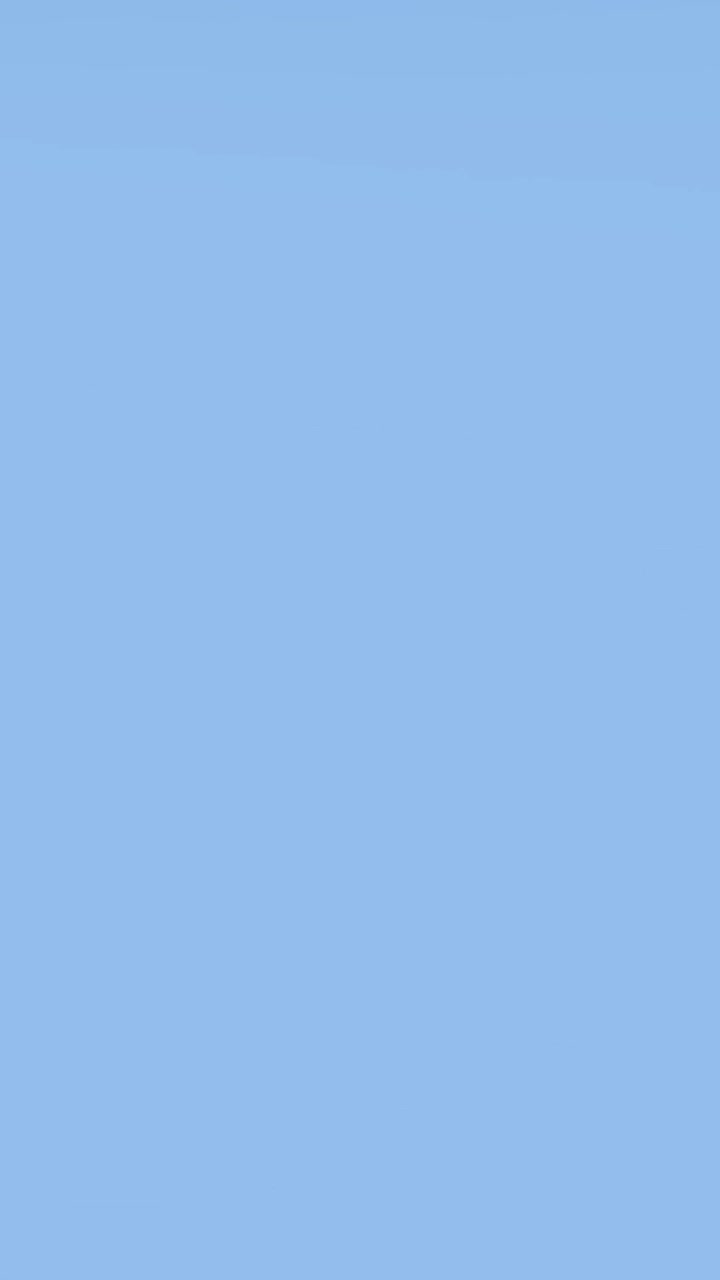 Animation of silver house keys against copy space on blue background