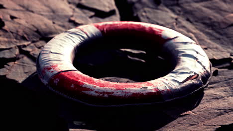 very old abandoned grungy lifebuoy