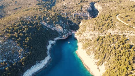 a drone shot of the beach stiniva cove beach of adriatic sea, vis island,dalmatia, croatia