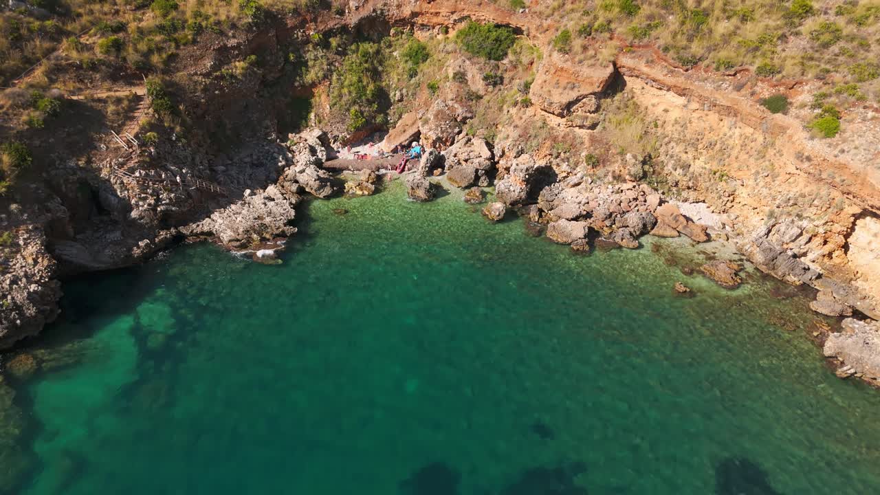 Aerial view of Cala Rossa cove in Sicily, Italy. Stunning coastal scenery
