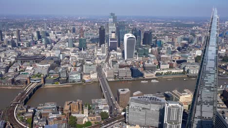 aerial view of the south bank from london bridge showing a city view, the shard and the tower of london and tower bridge