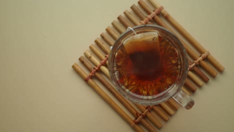 glass tea cup with tea bag