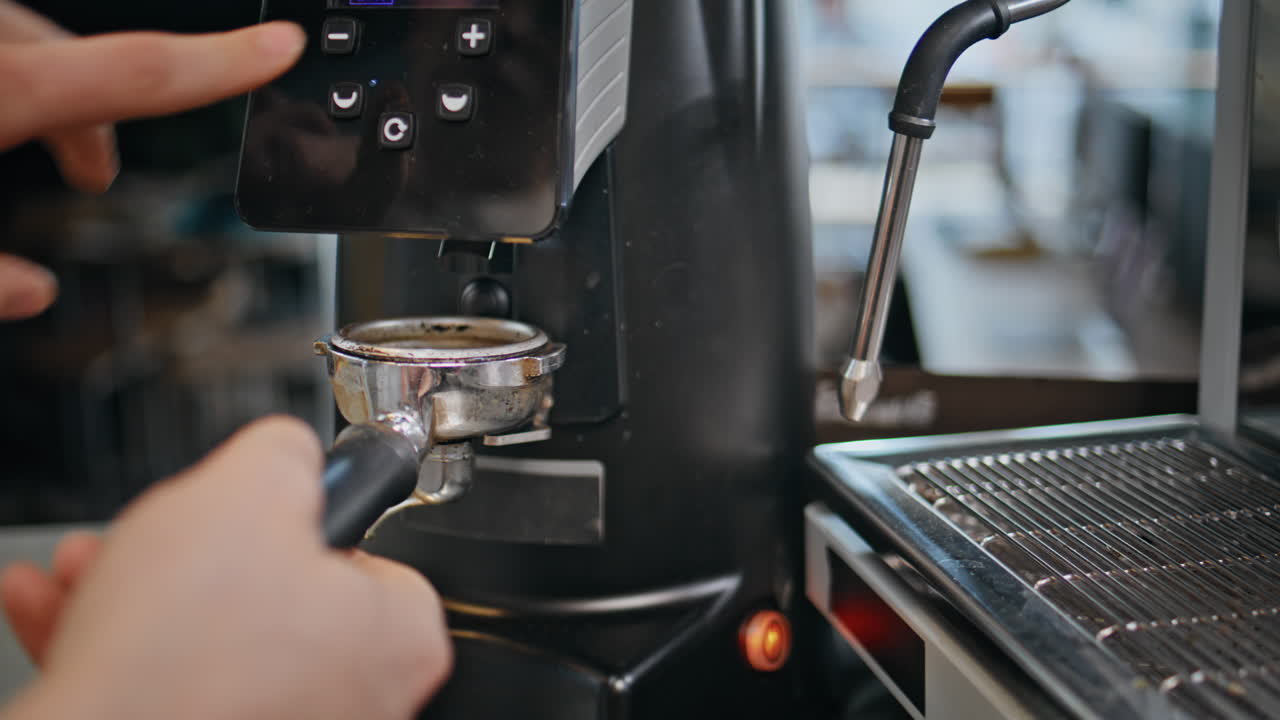 Barista hand making fresh coffee counter closeup. Bartender preparing espresso