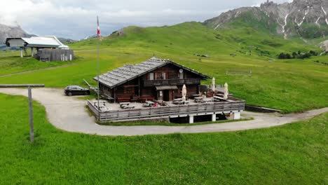 alpine hut with ski lift in the background filmed in summer