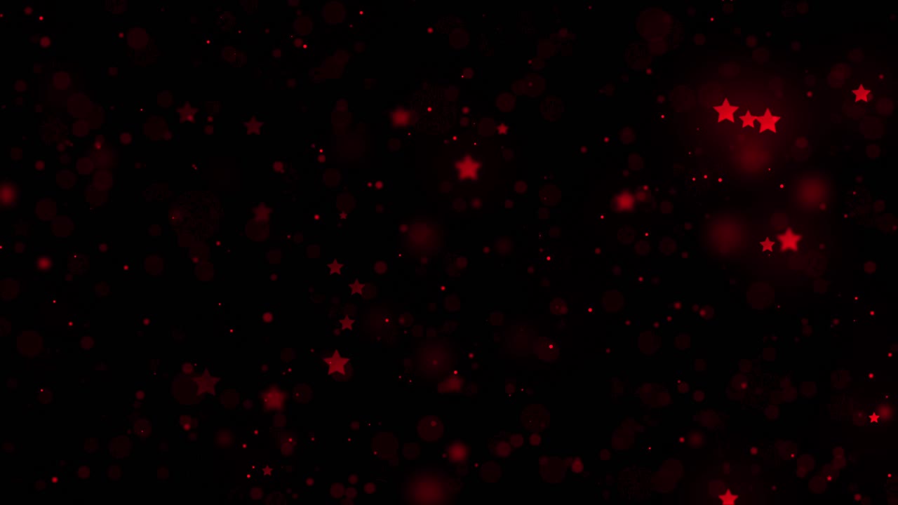 Red stars and particles gently fall against black background. Perfect for Christmas, awards, or magical overlays. Seamless loop
