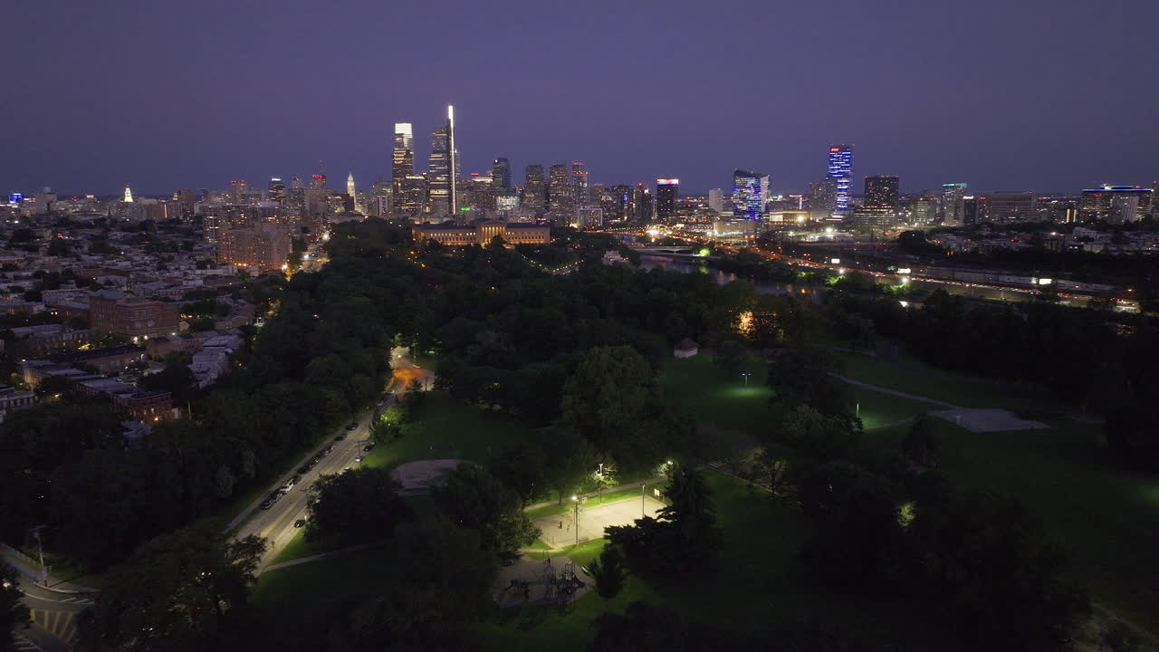 Aerial view of the Philadelphia skyline at night. Shot along the Schuylkill River