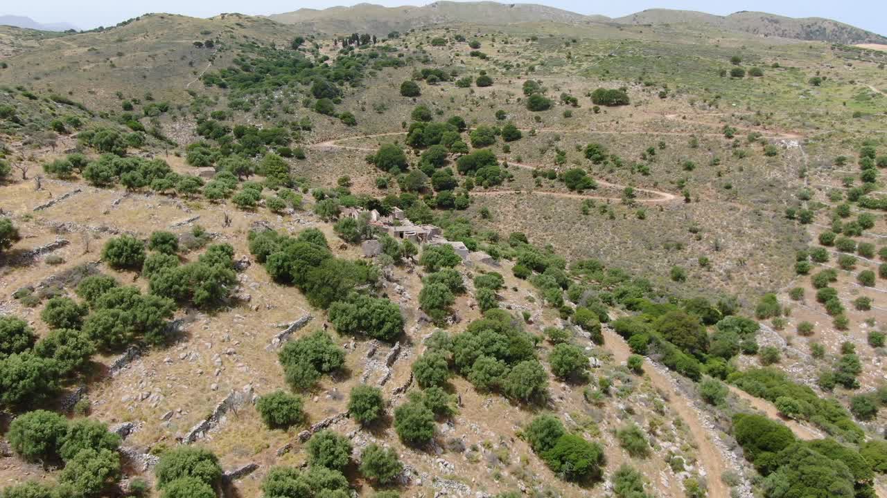 Aerial flying over the remains of an abandoned village in Spinalonga island, Crete