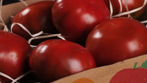 red tomatoes in a box