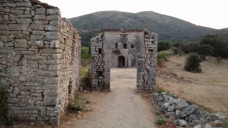 aerial of old perithia village revealing mount pantokrator, corfu, greece