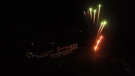 Firework-Display-In-Front-of-Large-Hotel