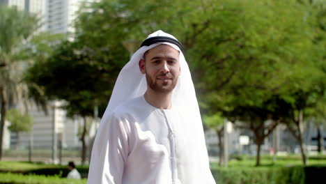 man with arabic clothing in the street