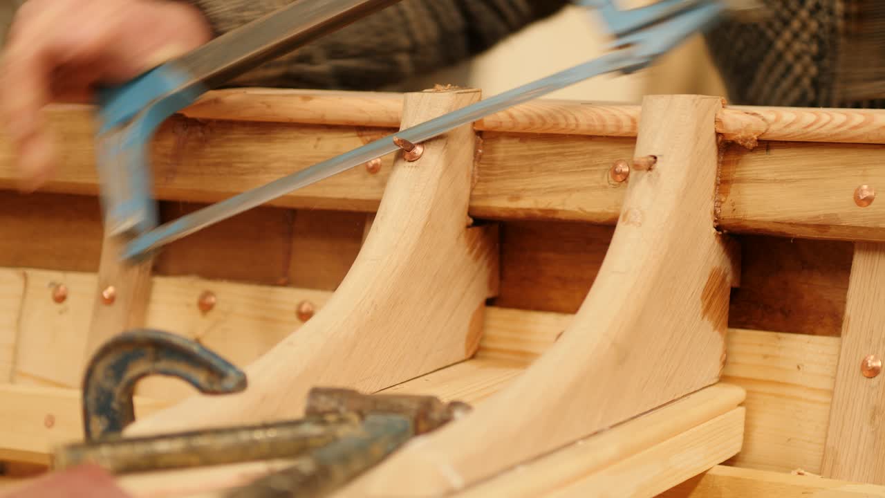 Cutting Copper Nail on Wooden Boat Frame