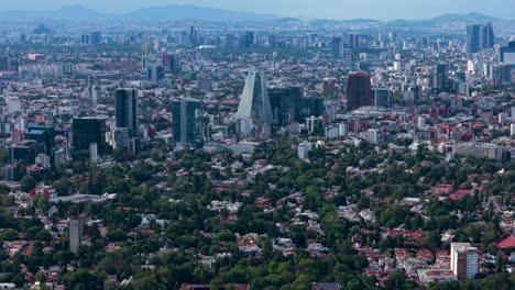 drone view of mexico city on a clean and clear summer sky day