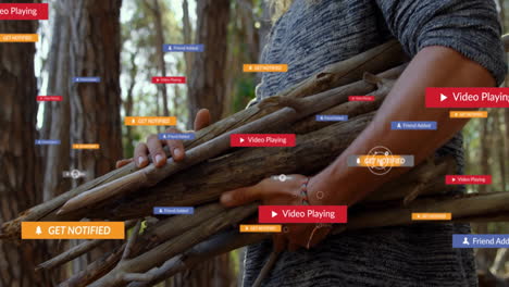 man holding wooden sticks in pine forest, featuring floating ar technology notification icons