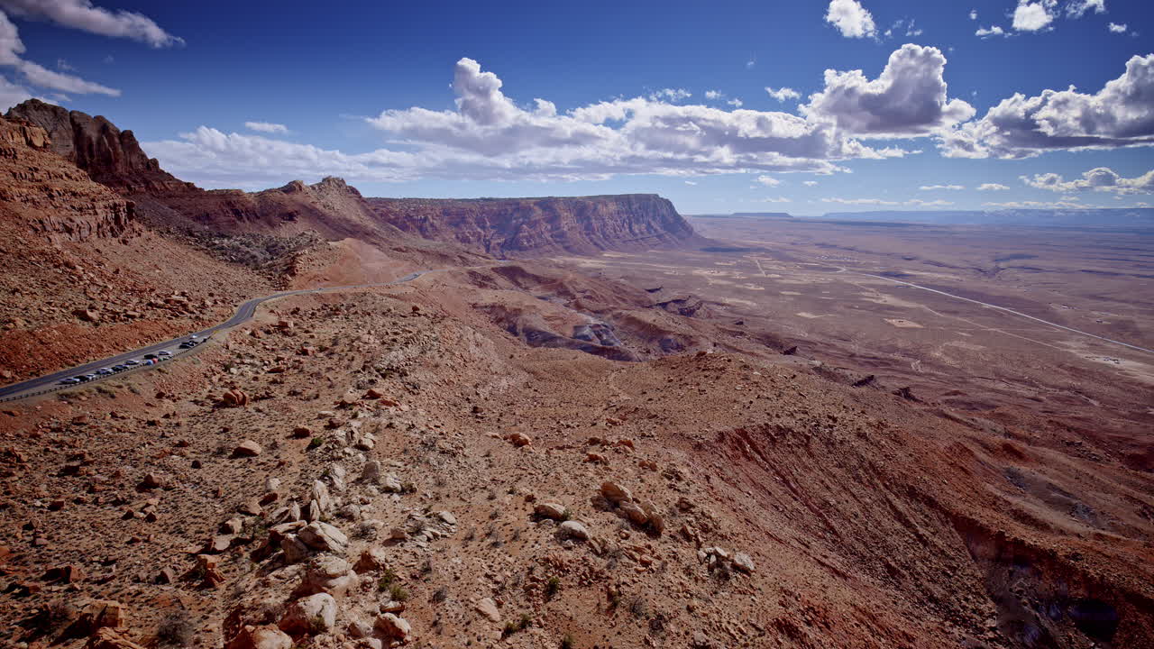 Drone footage shows a striking canyon pass carved deep into the red rock terrain of Arizona.
