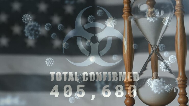 Covid-19 pandemic animation with rising cases and virus cells over U.S. flag.