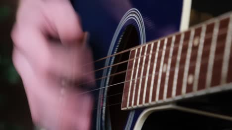 cuban man playing guitar closeup