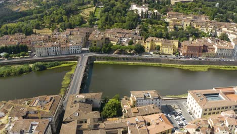 drone reveals tuscan landscape outside of florence on beautiful summer afternoon