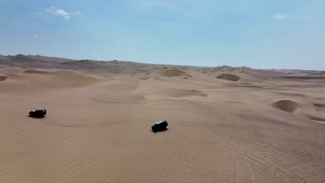 dune buggies in huacachina, peru desert