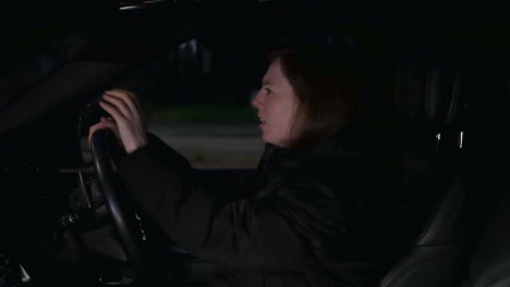 frustrated female driver stuck in traffic jam late at night