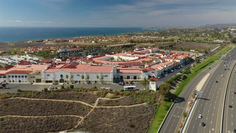 aerial view of the san clemente outlets mall along side the five freeway in california