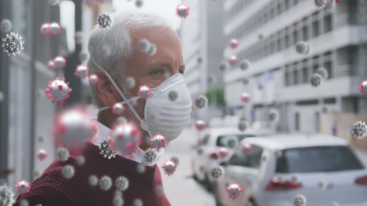 Animation of covid 19 cells over senior man wearing face mask