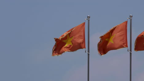 4k video of national flags of vietnam with a flag of communist party of vietnam or cpv