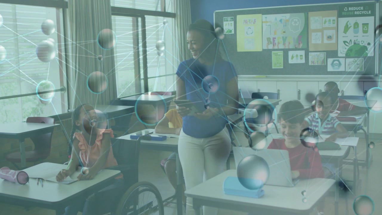 Female teacher tapping tablet and engaging students in class animating floating network