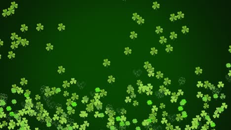 Animation-of-green-clovers-moving-on-dark-green-background-for-St.-Patricks-day