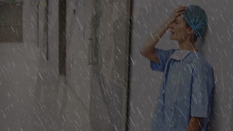 병원에서 앉아있는 스트레스를 받은 백인 여성 의료 종사자에 대한 텍스처화 된  ⁇ 어리