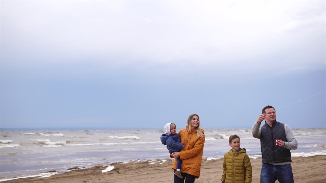 Family Kite Flying at the Beach