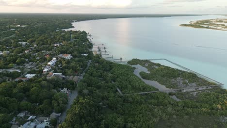 Aerial-of-Laguna-7-colours-in-Bacalar-Mexico-Quintana-Roo-travel-destination-resort-beach-town