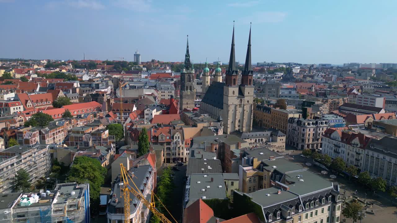 halle - saale - showing the iconic landmarks of the city center with its medieval buildings. Marvelous aerial view flight speed ramp hyper motion time lapse