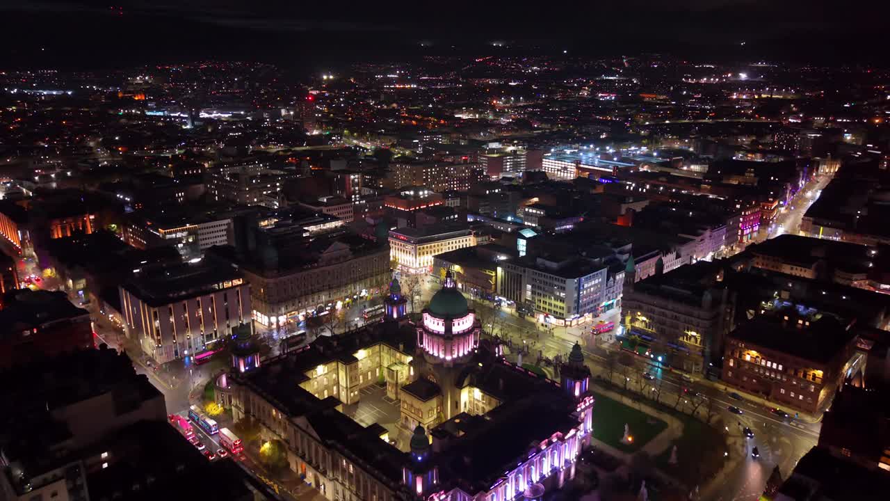 4K 60FPS aerial of the Belfast City Hall and the surrounding area at nighttime. Produced in Northern Ireland with Rec709 color profile