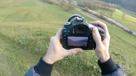 pov of person handheld shooting video with camera