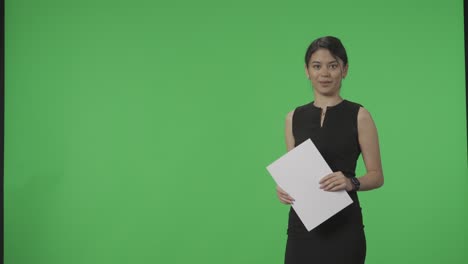 businesswoman presenting on green screen