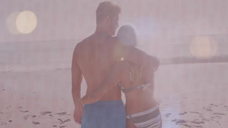 embracing on sandy beach, couple enjoying ocean view and animation together