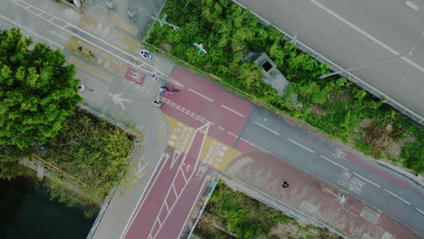 hong-kong-china-asia,-aerial-top-down-of-cross-road-intersection-in-the-city-center-Downton-of-main-metropolitan-area