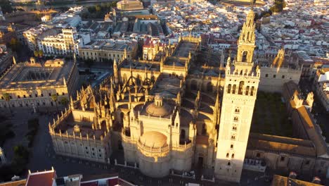 catedral de sevilla. drone shot of the beautiful spanish city of seville at the sunrise, uhd, 4k