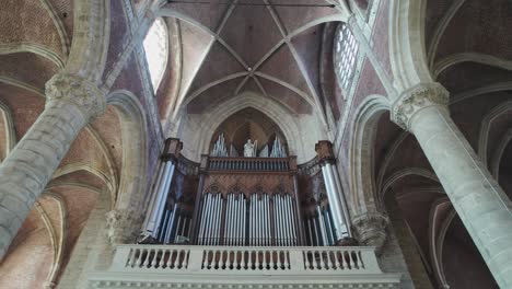 majestic pipe organ with gothic arches inside saint michael's church in ghent belgium