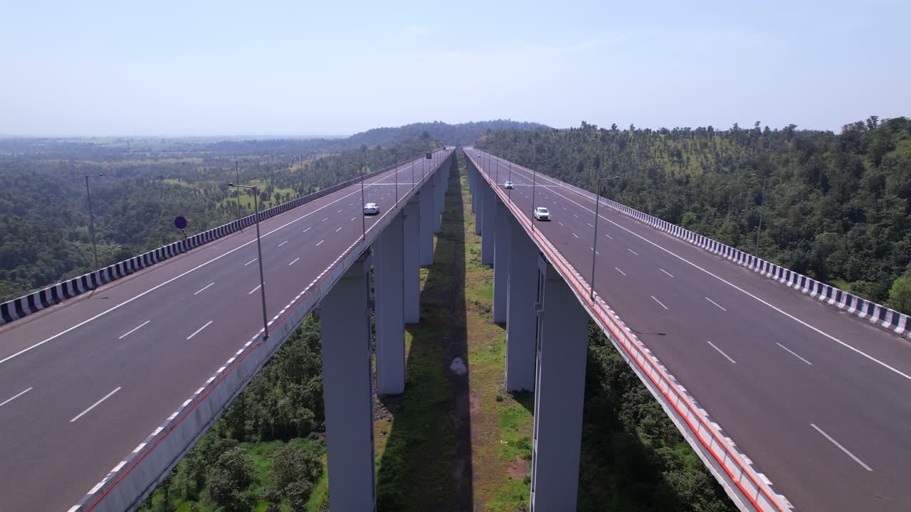 Mumbai Nagpur Expressway viaduct bridge through Western Ghats valley, Maharashtra, Drone shot