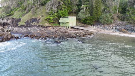coastal cabin and rocky shore