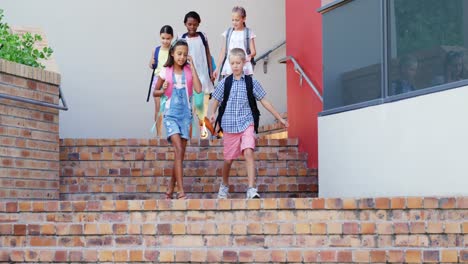 school kids walking on staircase